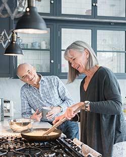 Seniors cooking in kitchen